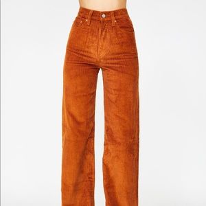 Levi burnt orange rib cage wide leg, corduroy  size 27